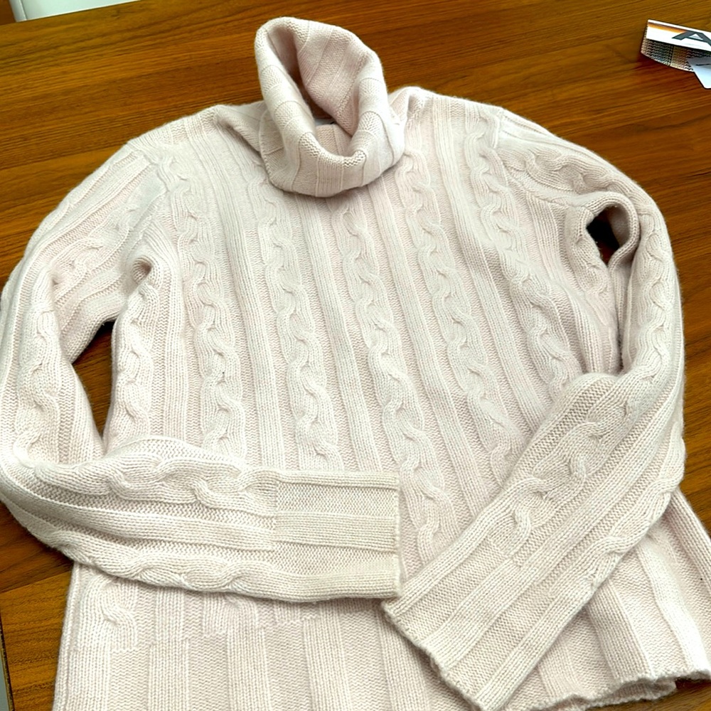 Light Pink turtle neck cable sweater. So soft.